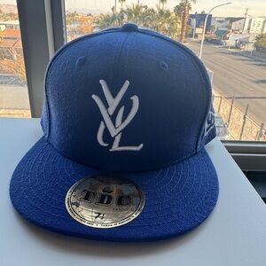 YVL Fitted in Blue size 7 1/2